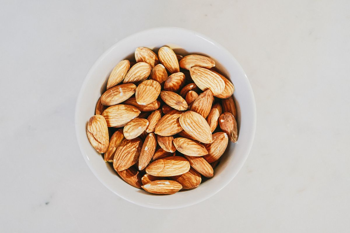 Almonds in a white bowl